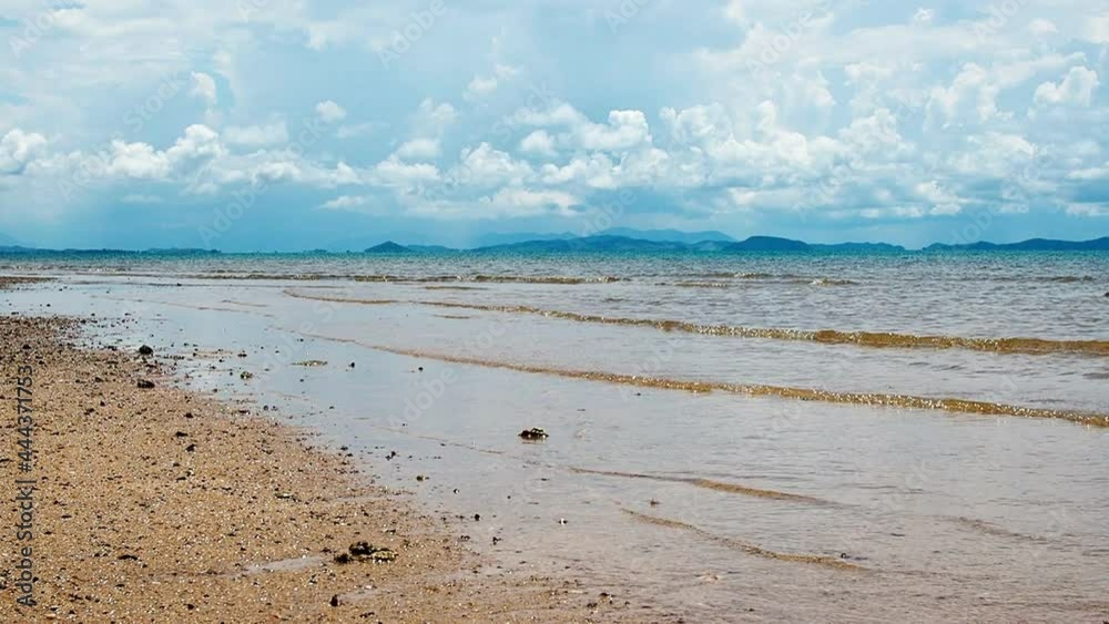 The sea water washed into the shore with soft rocks. The sea water washed into the shore with soft rocks.