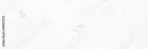White concrete stone surface paint wall background, Grunge cement paint texture backdrop, White rough concrete stone wall background, Copy space for interior design background, banner, wallpaper © mangpor2004