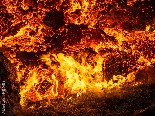 Glowing river of lava from Fagradalsfjall volcanic eruption at Geldingadalir, Iceland photo