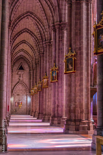 View of the interior of an aisle in Basilica of the National Vow, in Quito (Ecuador), a Roman Catholic neo-gothic cathedral located in the historic center of the capital.