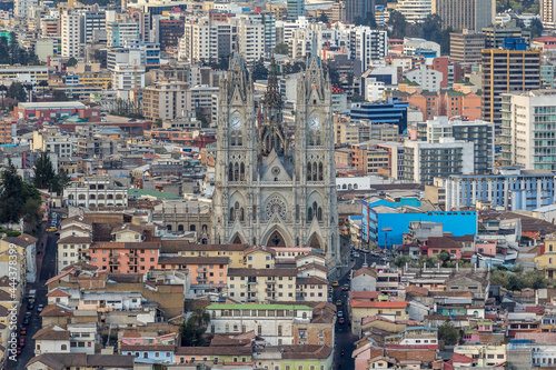 Quito is the capital city of Ecuador. Basilica of the National Vow is found in the colonial center of the city. Photo of cityscape taken from top of mount Panecillo.