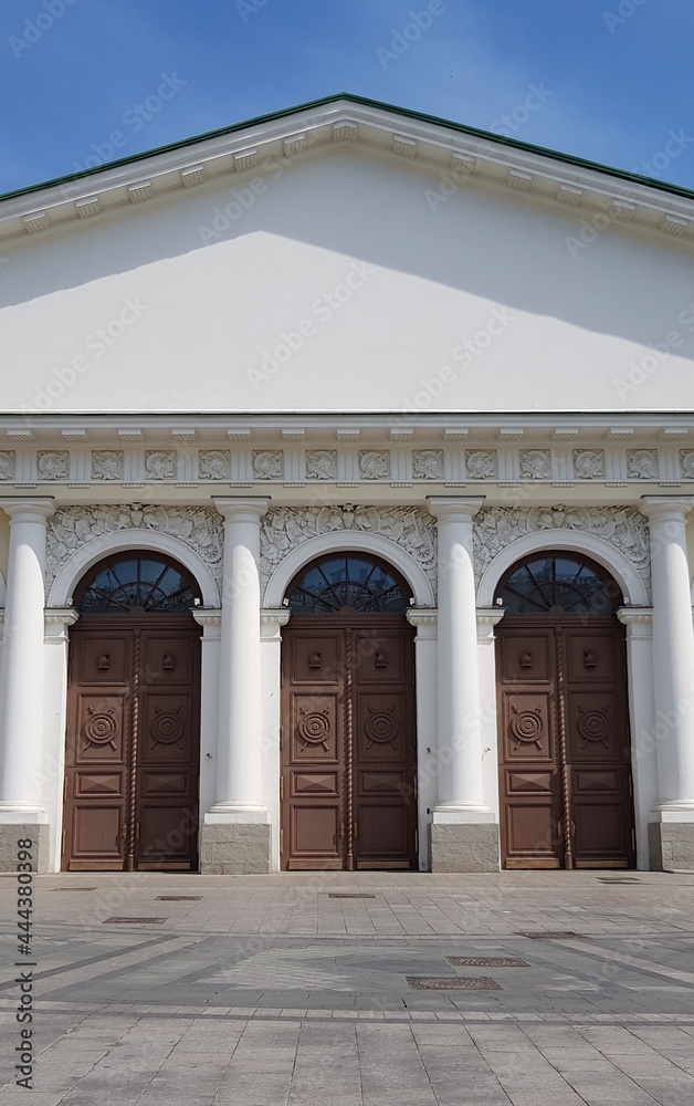 Antique wooden doors in a stone building