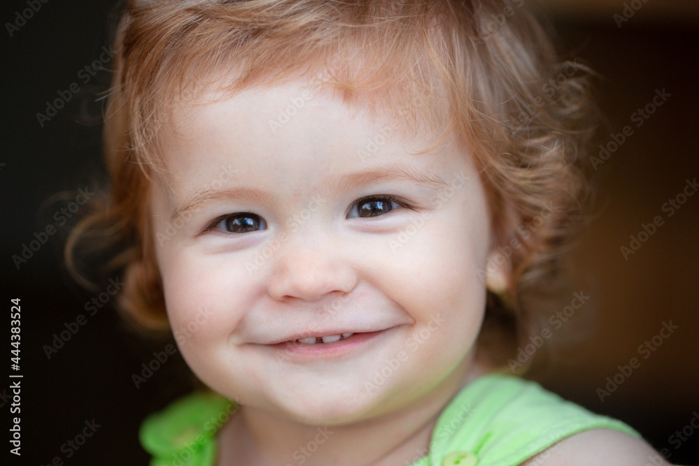 Smiling infant, cute smile. Kids baby macro portrait, close up head of cute child. Smiling infant, cute smile. Kids baby macro portrait, close up head of cute child.