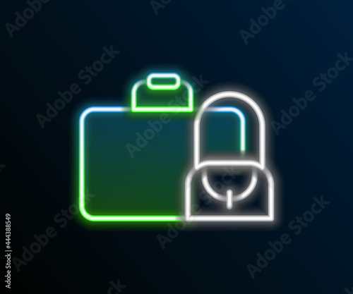 Glowing neon line Suitcase for travel icon isolated on black background. Traveling baggage sign. Travel luggage icon. Colorful outline concept. Vector