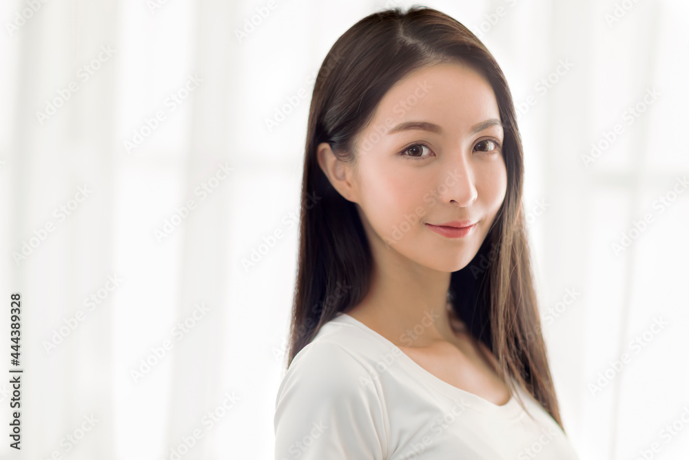 closeup beautiful young asian woman face with clean healthy skin closeup beautiful young asian woman face with clean healthy skin
