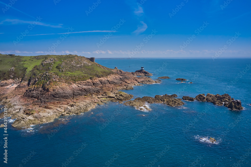 Aerial Drone image of Noirmont Point, Jersey Channel Islands with blue sky and calm sea