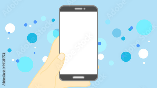 スマホを持つ手 水色背景