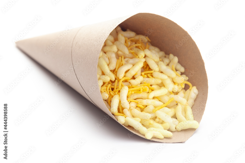 Close-Up of Crunchy Lemon Bhel In handmade ( handcraft ) brown paper cone bag made with Puffed Rice small besan sev. Indian spicy snacks (Namkeen), Close-Up of Crunchy Lemon Bhel In handmade ( handcraft ) brown paper cone bag made with Puffed Rice small besan sev. Indian spicy snacks (Namkeen),