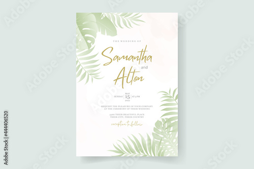 Wedding invitation template with tropical palm leaf design