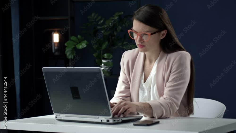 Businesswoman communicates with his business partner in a friendly manner, actively gesturing. Distant work.