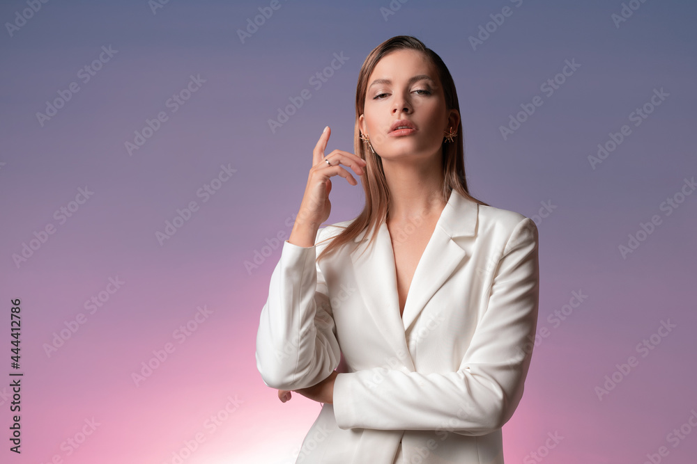 Stylish fashionable young woman in a luxurious white suit, Stylish fashionable young woman in a luxurious white suit,