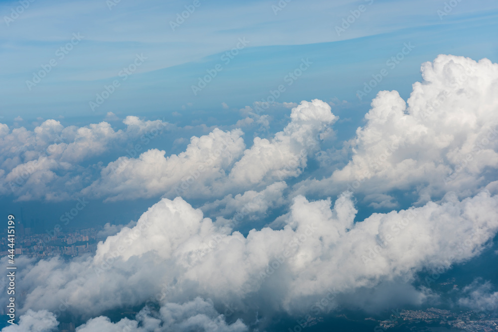 View of blue sky and white clouds during the flight View of blue sky and white clouds during the flight
