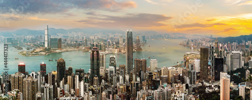 Panorama view of Hong Kong skyline on the evening seen from Victoria peak, Hong Kong, China. © tanarch