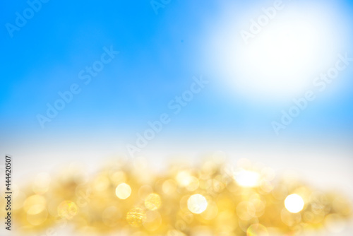 Abstract background with bokeh. Defocused summer sunny beach. Sunshine. copy space. Hot weather.