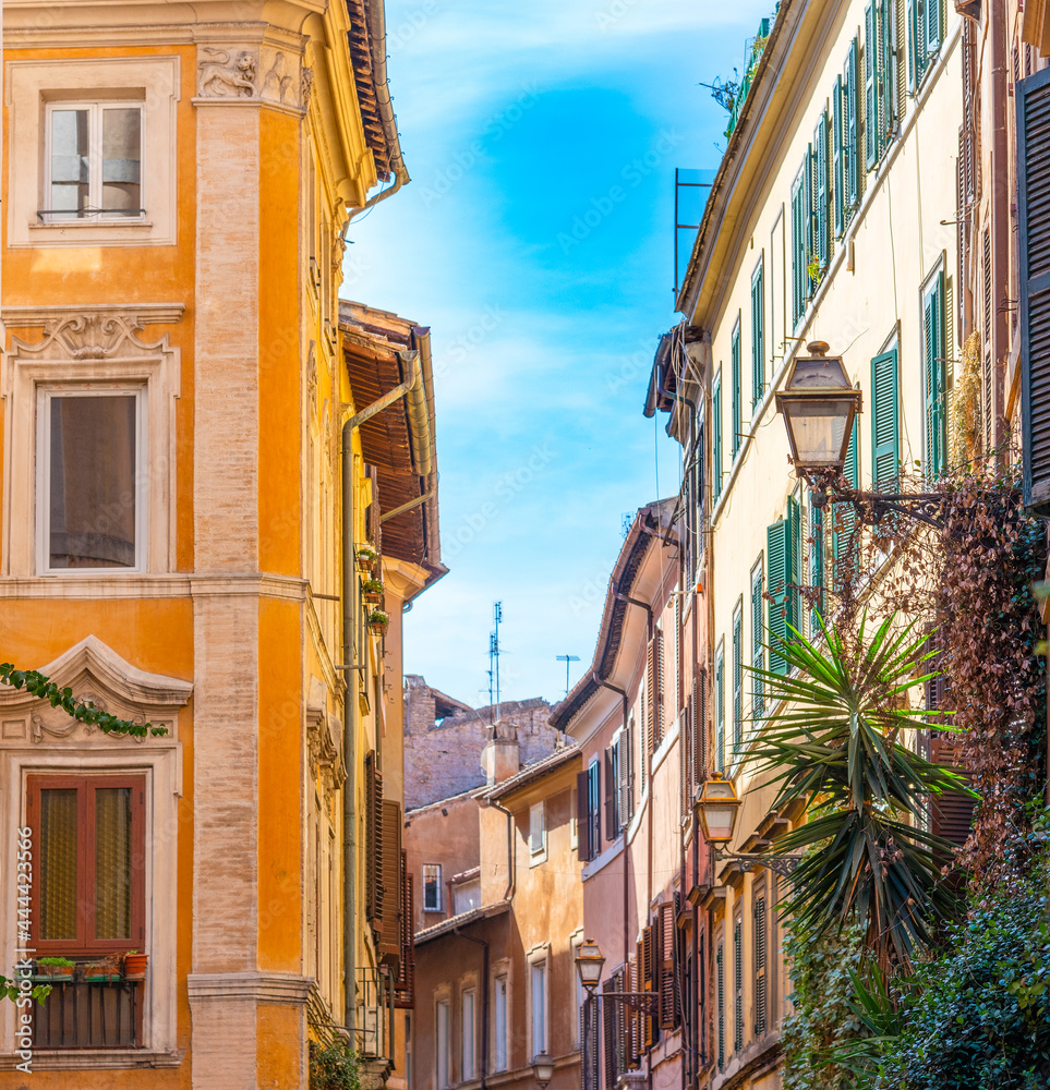 Blue sky over a narrow street in Rome