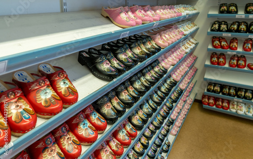 shelves of colorful Swedish Dala clogs in a souvenir boutique photo