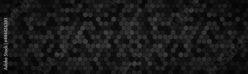 Dark widescreen banner with hexagons with different transparencies. Modern black geometric design header. Simple vector illustration background © kurkalukas
