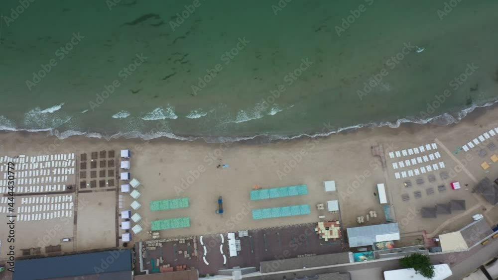 Video 4K panning from a drone Mavic 2 about the sea coast with beaches and a recreation area of a modern city Video 4K panning from a drone Mavic 2 about the sea coast with beaches and a recreation area of a modern city