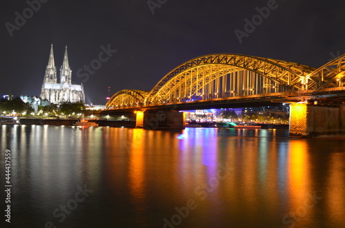 Cologne cathedral and bridge at night