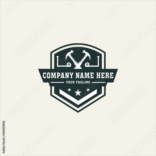 label construction carpentry, hammer, handsaw, repair, veteran, vintage retro for business is a home renovation company.