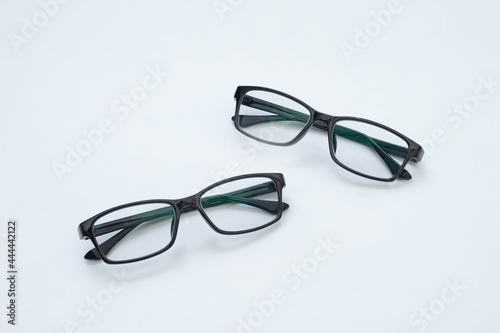 Black frame glasses isolated on white background. white board