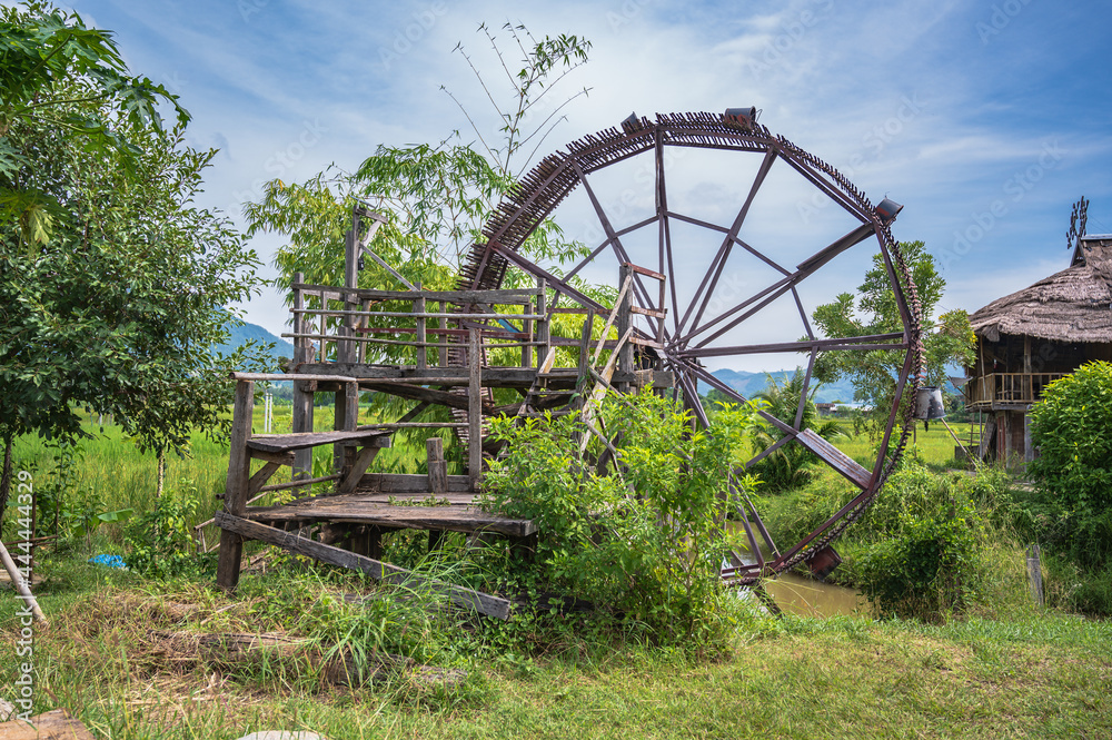Ancient Water turbine in Tai Dam Cultural Village & Museum chiang khan loei thailand.Chiang Khan is an old town and a very popular destination for Thai tourists Ancient Water turbine in Tai Dam Cultural Village & Museum chiang khan loei thailand.Chiang Khan is an old town and a very popular destination for Thai tourists
