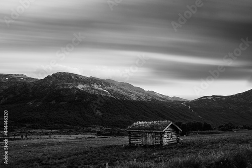 barn in the mountains. Black and white photo.