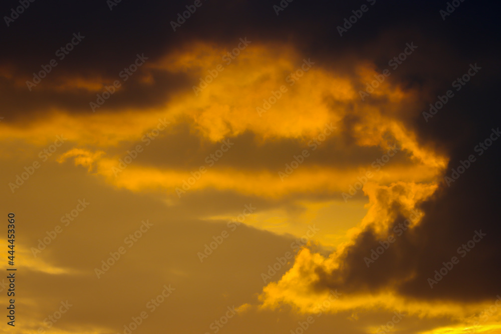 Clouds in orange and yellow during sunset. Shot in Sweden, Scandinavia