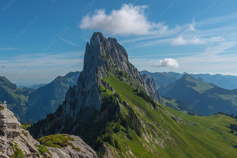 Landscape view of Gastlosen mountain area, with clear skies in the background, shot in Jaun, Fribourg, Switzerland