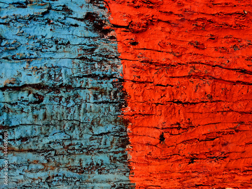 old painted wood texture, wood texture background. blue and orange color painted on wood.