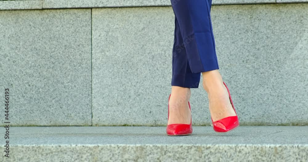 Red Classic Womens Heels Shoes Supply. Beautiful Female Legs are Walking Down the Street, close-up, Blue Dress Pants, Womens Suit, Business Meeting, Business Woman, Business Lunch, Red Classic Womens Heels Shoes Supply. Beautiful Female Legs are Walking Down the Street, close-up, Blue Dress Pants, Womens Suit, Business Meeting, Business Woman, Business Lunch,