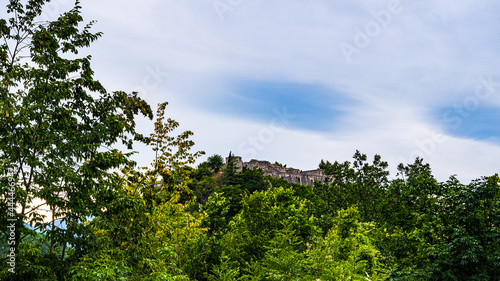view of the medieval castle of Laviano, Italy. with trees and forest