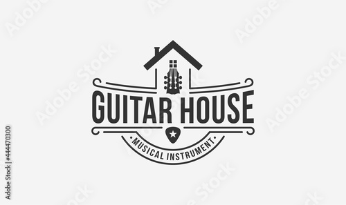 musical instrument logo design with the house and guitar element.