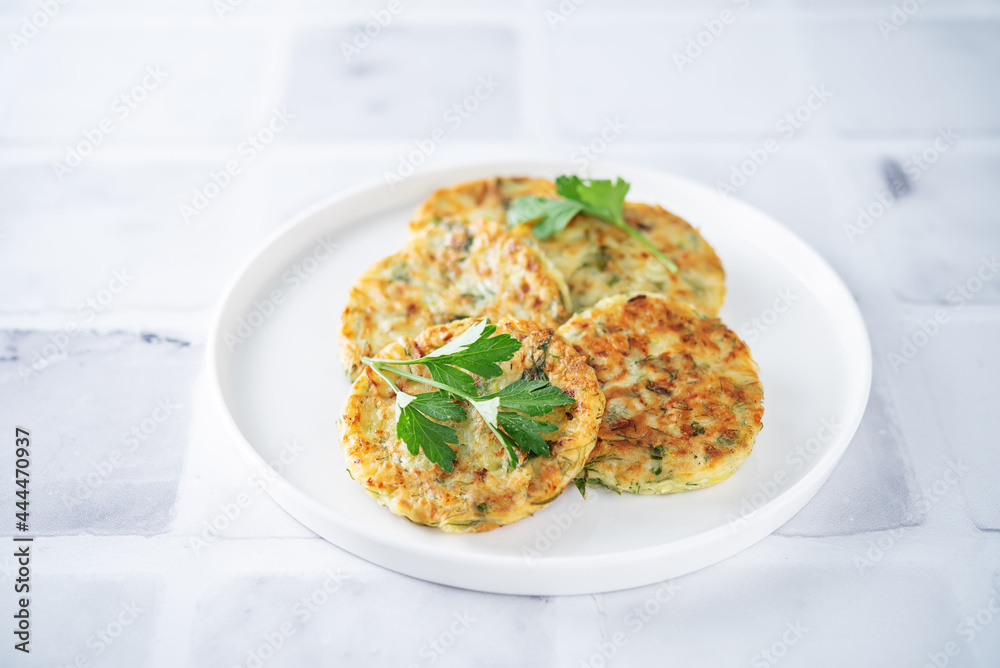 Zucchini dill parsley fritters with Greek Yogurt Sauce