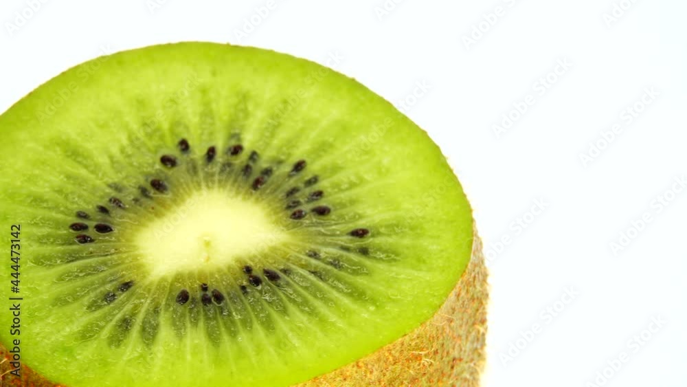 4K Cut Kiwi fruit isolated on white background, Three kiwi fruit, Close up. Rotating shot. 4K Cut Kiwi fruit isolated on white background, Three kiwi fruit, Close up. Rotating shot.