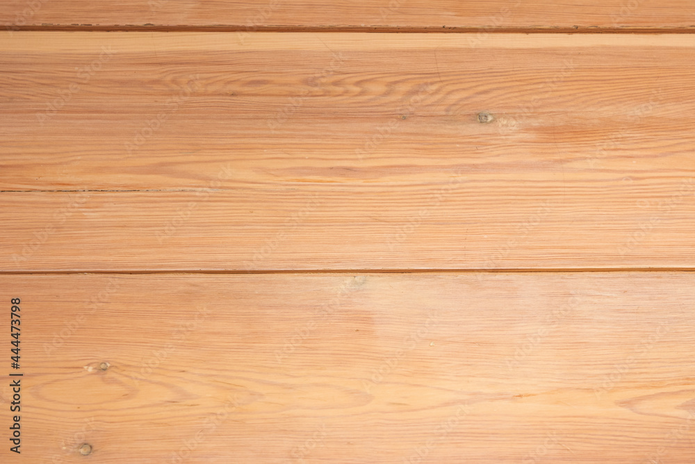 Varnished pine wood planks joined together on a tabletop. Vector wood background. Varnished pine wood planks joined together on a tabletop. Vector wood background.