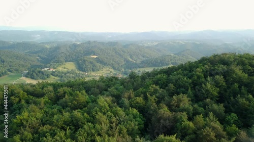 Cinematic aerial shot of an endless mountain and forest landscape in southern Slovenia. photo