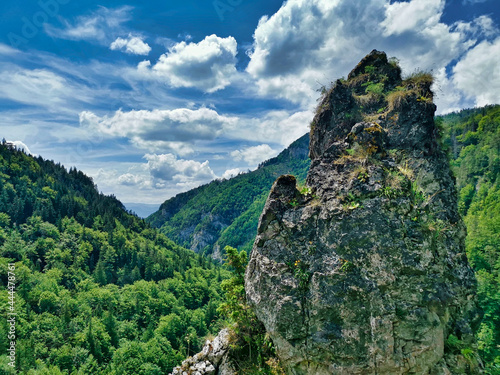 Wild rock above the valley in a mountains