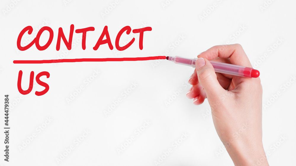 hand writing inscription contact us with marker, concept, stock image. hand writing inscription contact us with marker, concept, stock image.