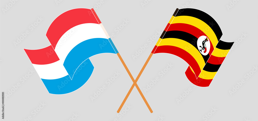 Crossed and waving flags of Luxembourg and Uganda Crossed and waving flags of Luxembourg and Uganda