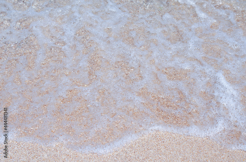 Sandy seashore with white sand. Beautiful summer background. 