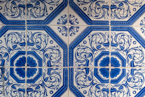 Retro old vintage floor tiles close up. Portuguese blue House Marocain style interior hydraulic ceramic mosaic tiles flooring