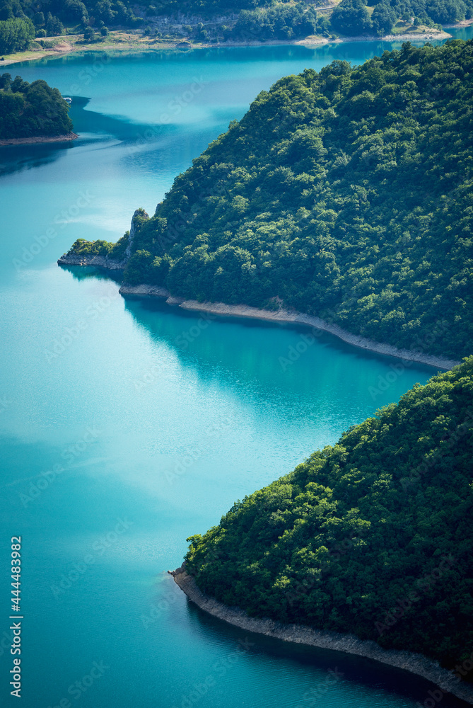 Fantastic azure color of Piva lake in Montenegro
