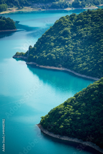 Fantastic azure color of Piva lake in Montenegro © Novak