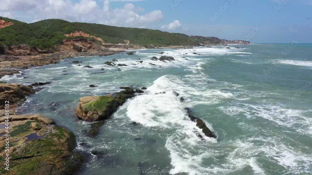 Aerial rocky coastline ocean Cape Coast Ghana Africa. Ghana West Africa on the Atlantic ocean. Sandy beaches. Summer vacation destination, resorts and hotels along sea water.