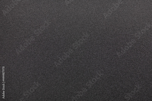 Texture of black sponge surface or background.