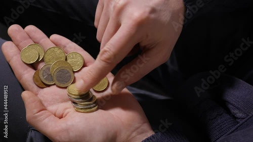 Poor man. Euro coins on palm of hand. Family poor hands counting coins. Poverty. Bank concept. Social issues. Economic depression man holding money in hand close up. Economic crisis financial problem
