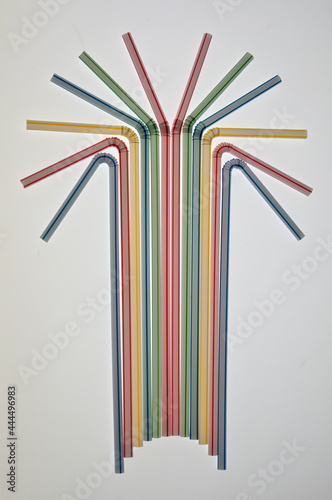 Plastic striped cocktail tubes on white background
  with subsequent processing in a graphics program