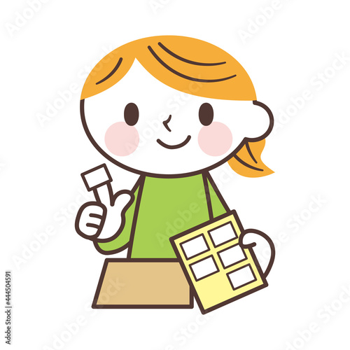 Woman sticking stickers シール貼りをする女性