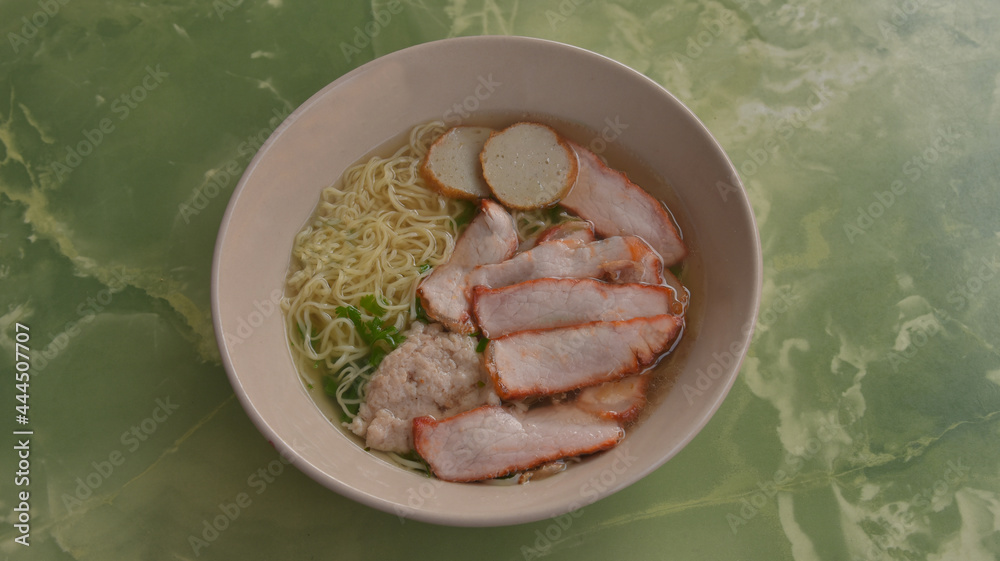 Noodle soup at market street food is very famous before work in the morning. Noodle soup at market street food is very famous before work in the morning.